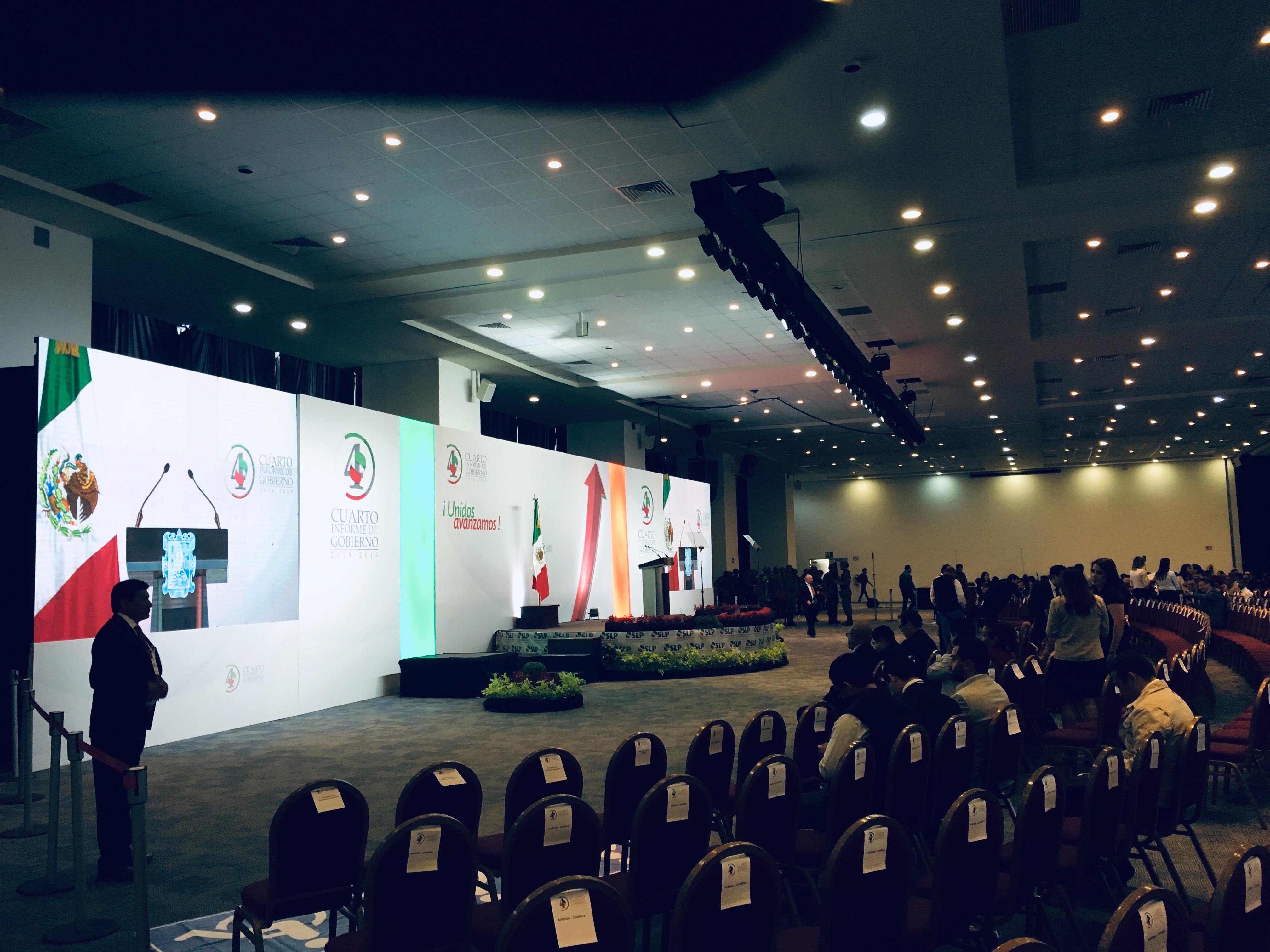 Government event stage setup with interpretation services provided